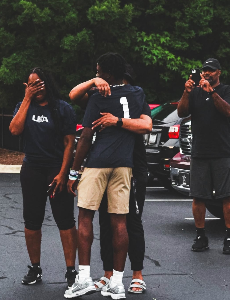 Raylen Hunter celebrating with his family after being named to the USA Baseball 15U National Team